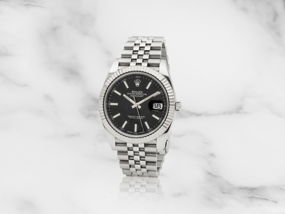 Rolex. Montre bracelet en or blanc 18K (750) et acier avec date mouvement automatique