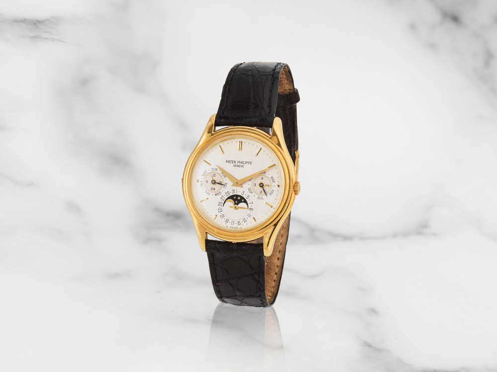 Patek Philippe. Belle montre bracelet en or jaune 18K (750) calendrier perpétuel et phase de lune mouvement automatique