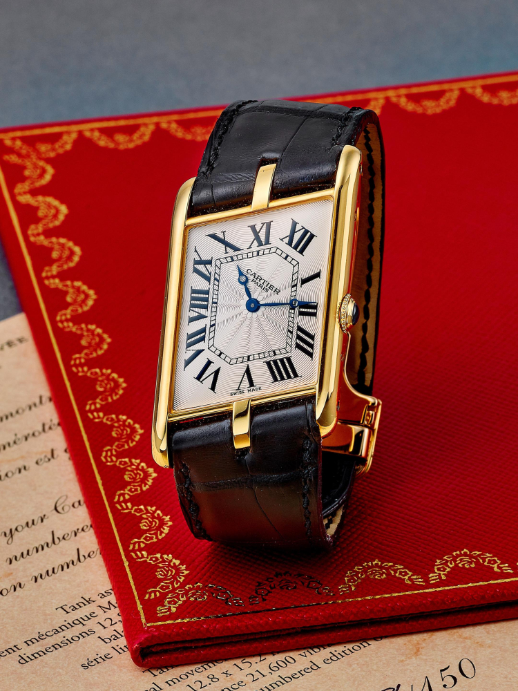 CARTIER | CPCP TANK ASYMÉTRIQUE "JUMBO", REF.2842, A RARE AND ICONIC LIMITED EDITION YELLOW GOLD WRISTWATCH, CIRCA 2000