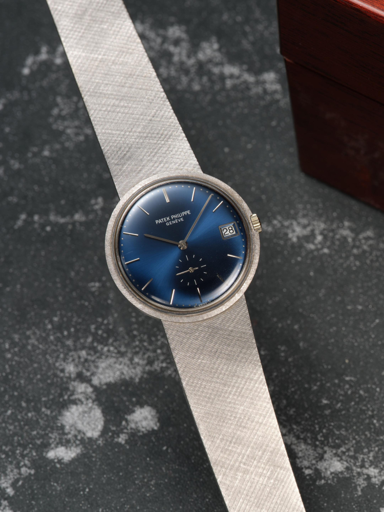 PATEK PHILIPPE | CALATRAVA, REF.3445/001, A RARE WHITE GOLD BRACELET WATCH WITH DATE, CIRCA 1970