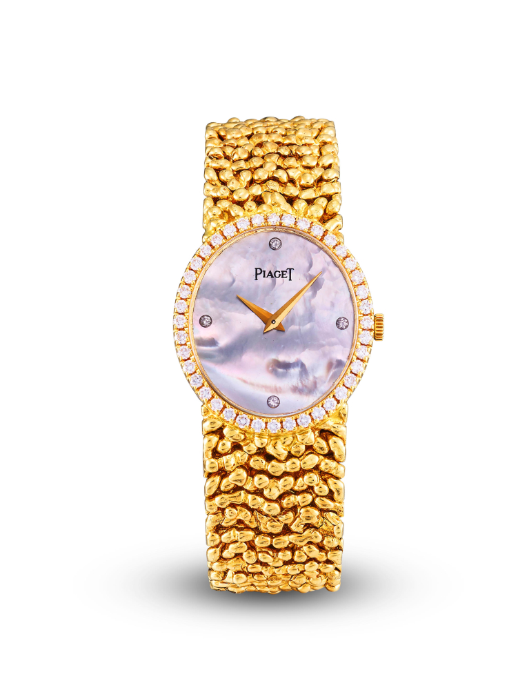 PIAGET | REF.9826 N 17, A YELLOW GOLD AND DIAMOND-SET BRACELET WATCH WITH MOTHER-OF-PEARL DIAL AND NUGGET BRACELET, CIRCA 1980