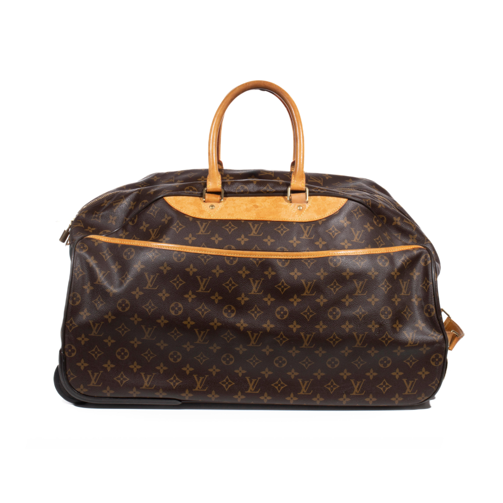 Louis VUITTON, circa 2009. Sac de voyage "Eole" à roulettes en toile Monogram et cuir naturel