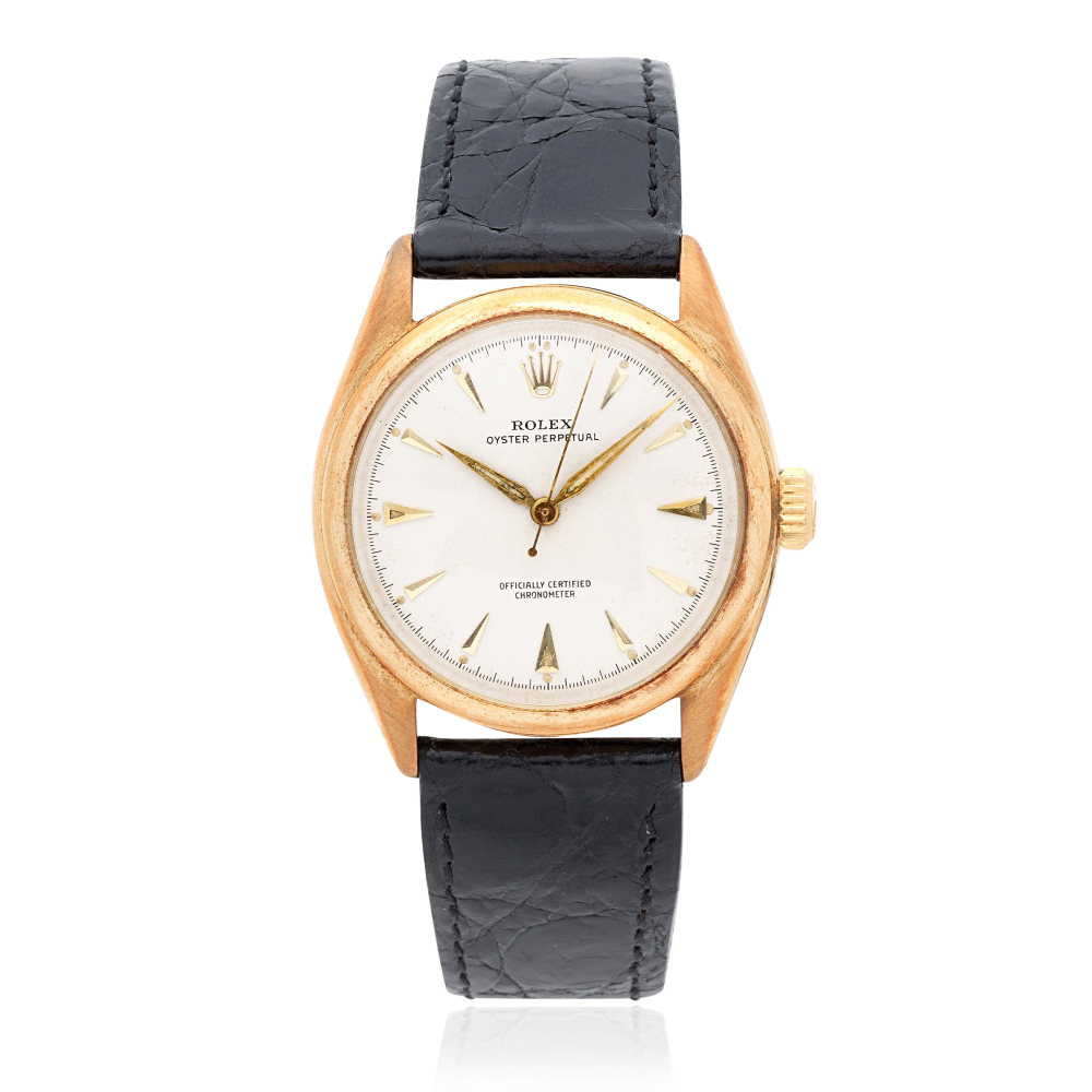 Rolex. A 14K gold automatic wristwatch