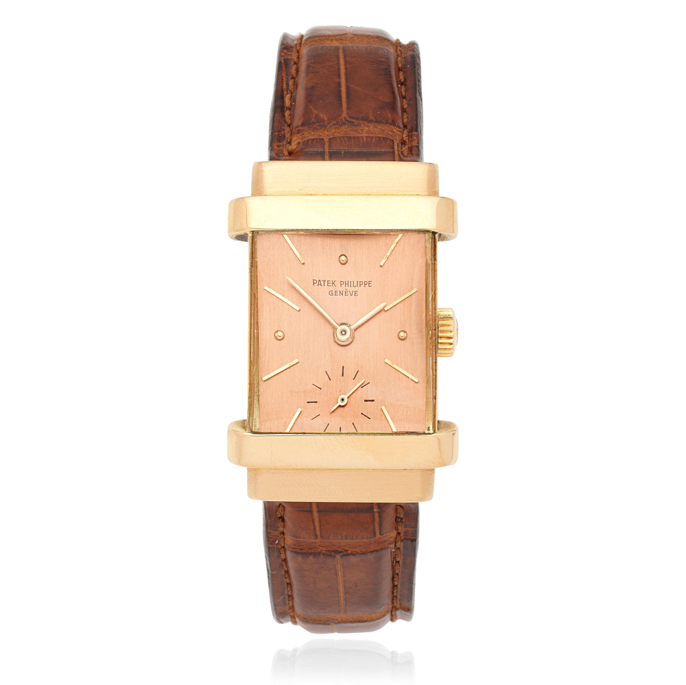 Patek Philippe. An 18K rose gold manual wind rectangular wristwatch with hooded lugs