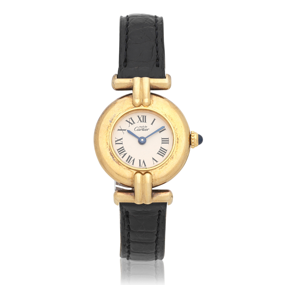 Cartier. A lady's gold plated silver quartz wristwatch