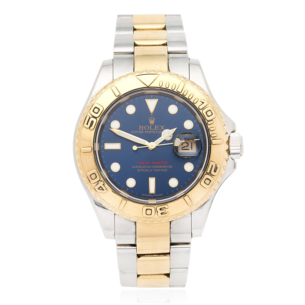 Rolex. A stainless steel and gold automatic calendar bracelet watch