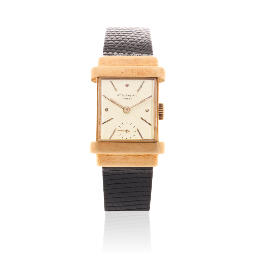 Patek Philippe. An 18K gold manual wind rectangular wristwatch with hooded lugs