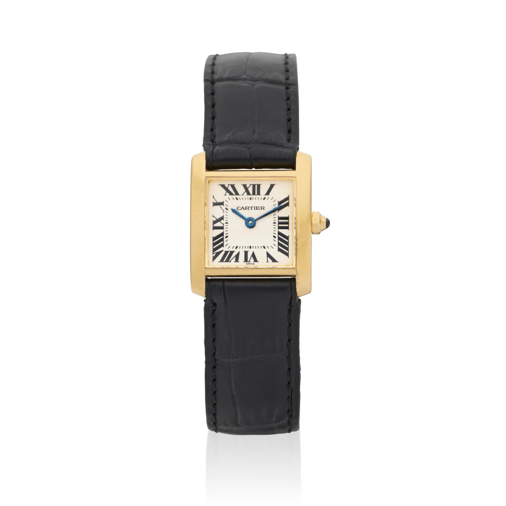 Cartier. A lady's 18K gold quartz wristwatch