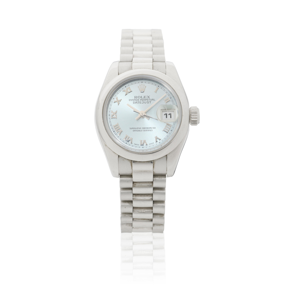 Rolex. A lady's platinum automatic calendar bracelet watch