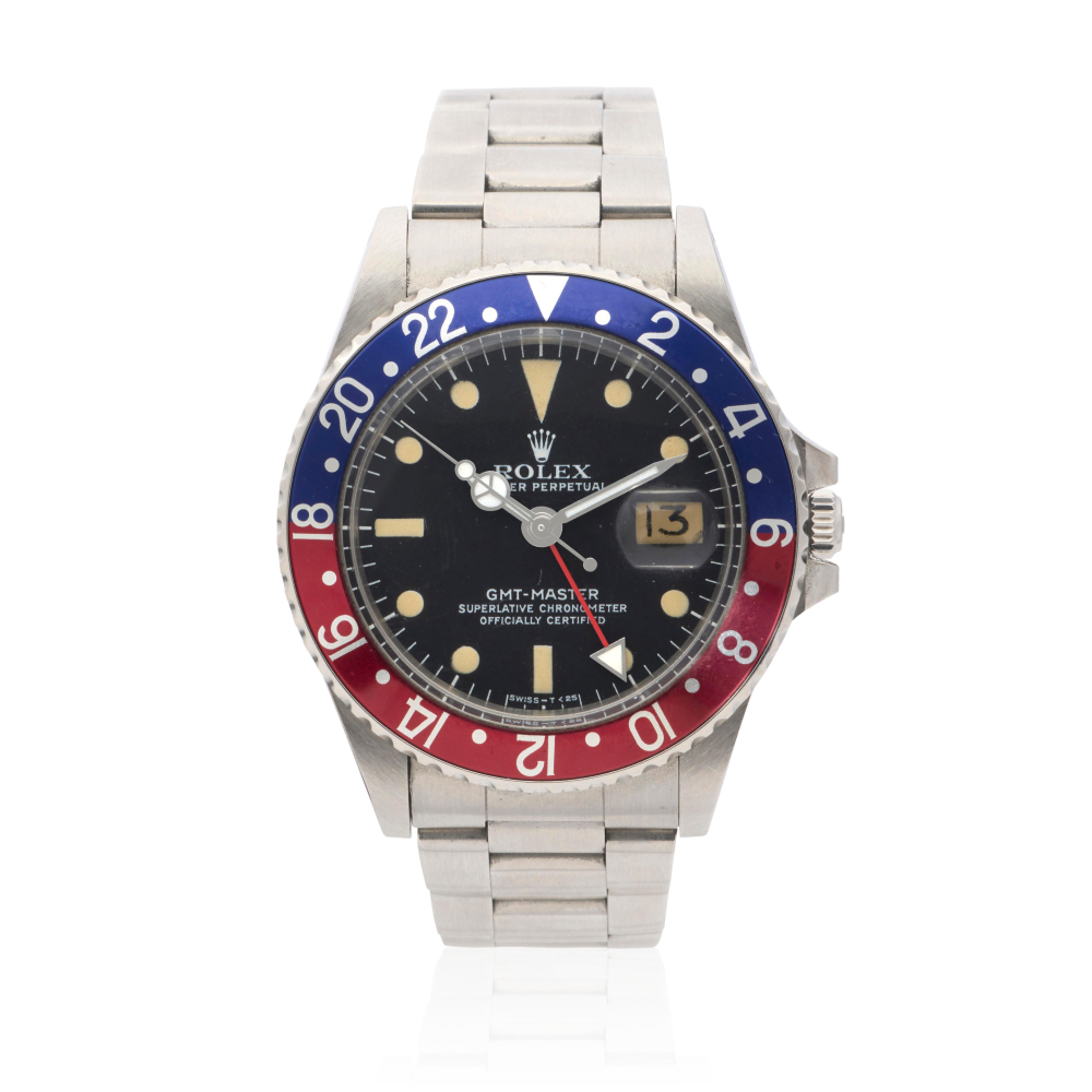 Rolex. A stainless steel automatic calendar bracelet watch with dual time zone