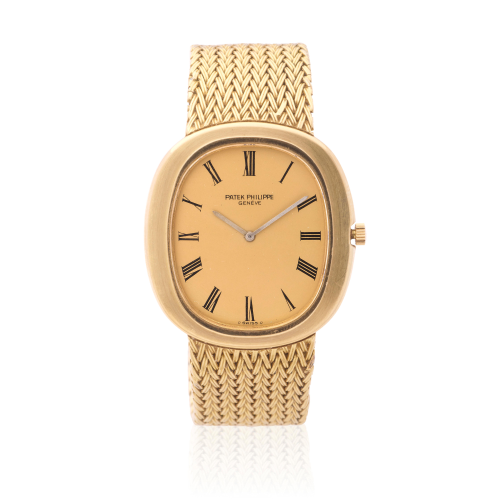 Patek Philippe. An 18K gold automatic bracelet watch with sigma dial