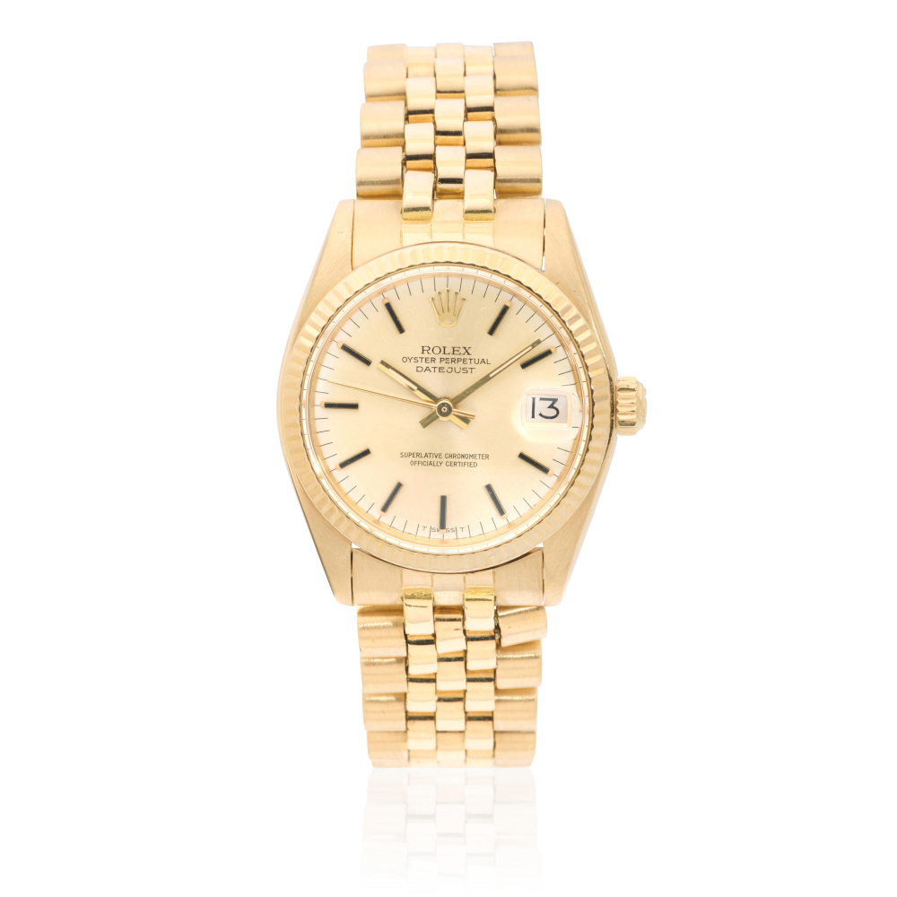 Rolex. A lady's 18K gold automatic calendar bracelet watch