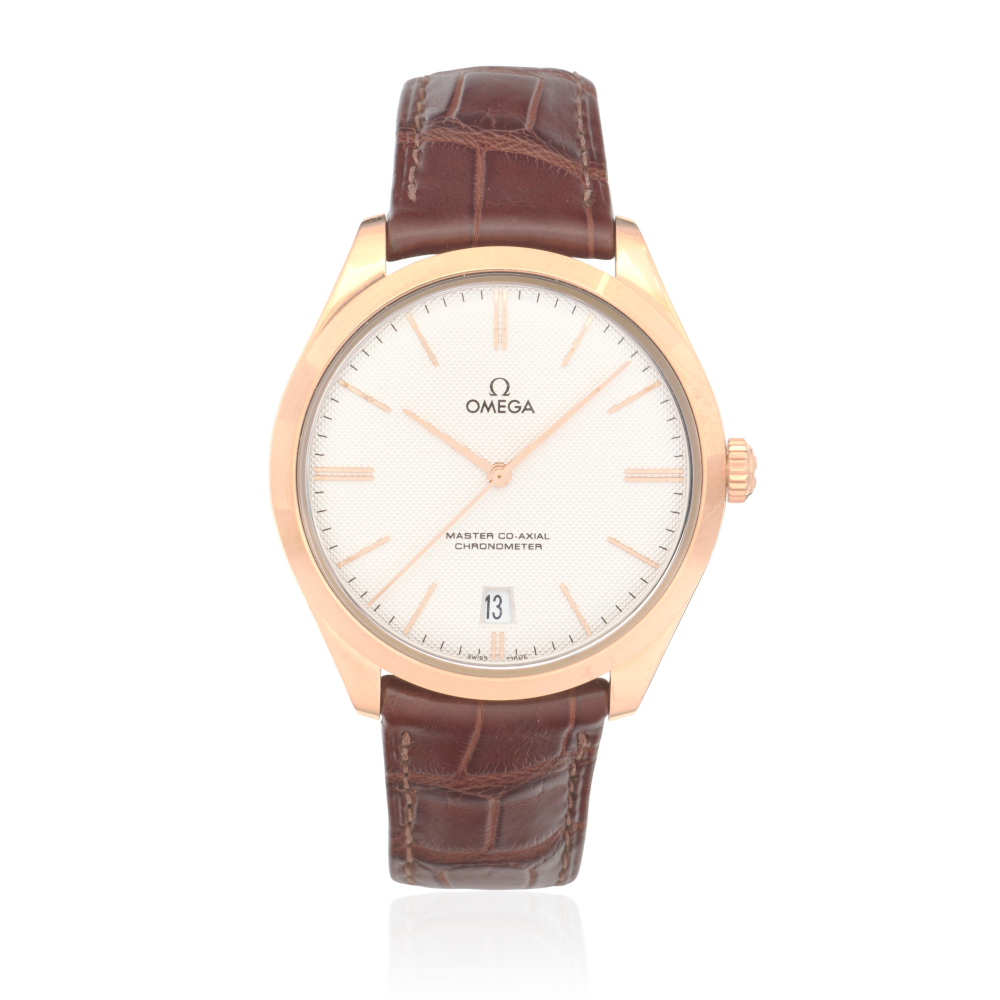Omega. An 18K rose gold manual wind calendar wristwatch with Co-Axial Escapement