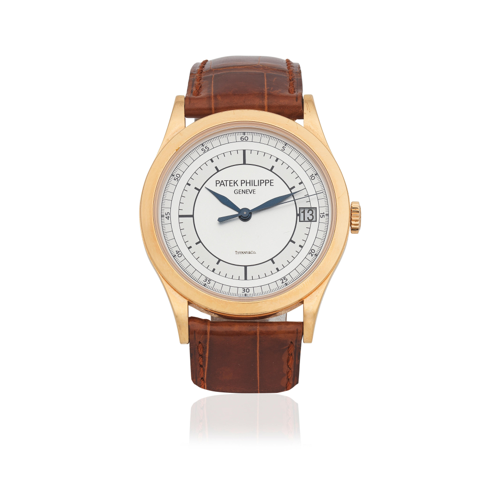 Patek Philippe. An 18K rose gold automatic calendar wristwatch retailed by Tiffany & Co.