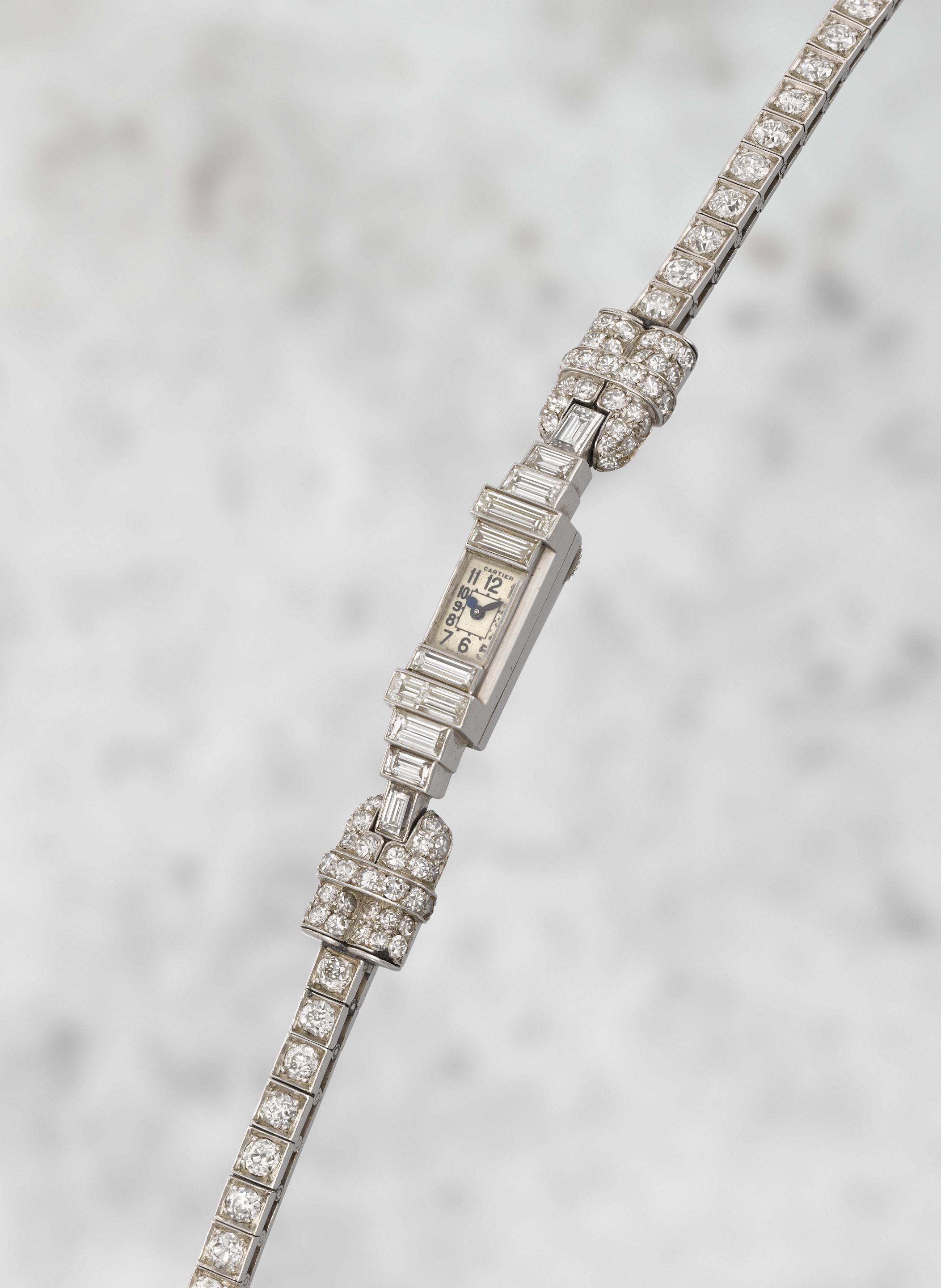 Cartier. A lady's rare platinum and diamond set manual wind bracelet watch offered on behalf of the family of the original owner