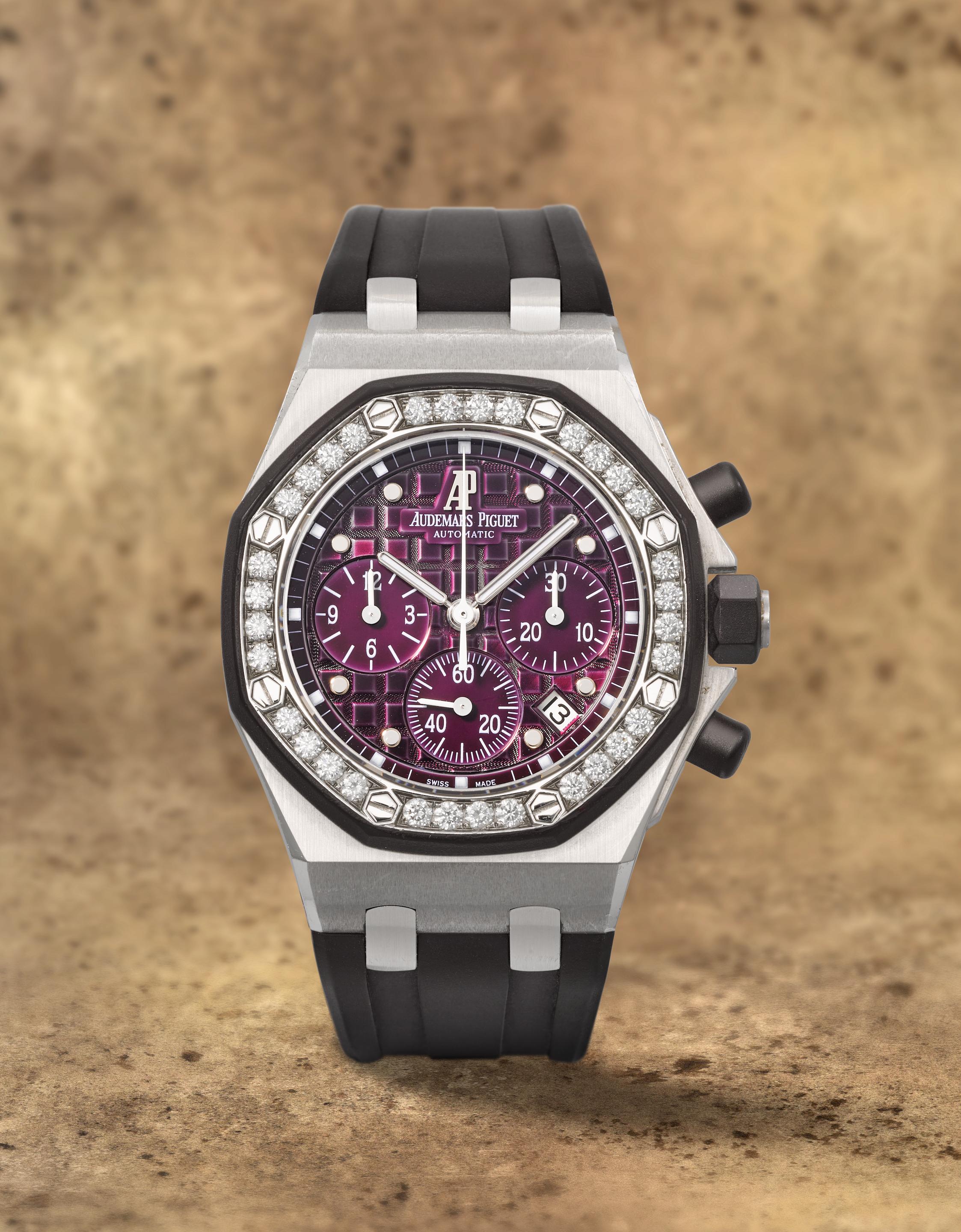 Audemars Piguet. A mid-size stainless steel diamond set automatic calendar chronograph wristwatch