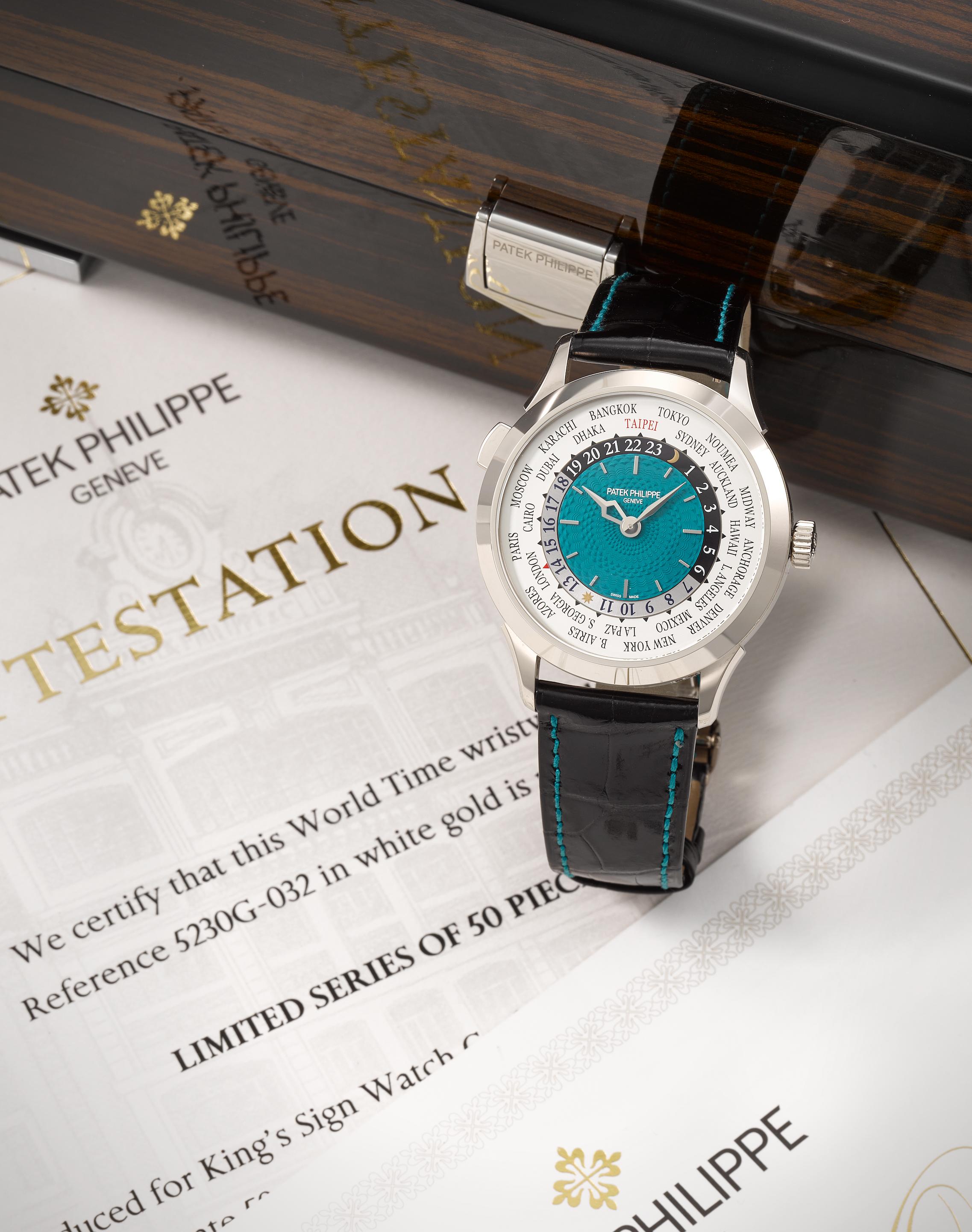 Patek Philippe. A fine and very rare Limited Edition 18K white gold automatic wristwatch with world time and 24 hour indication produced to commemorate the 100th anniversary of King's Sign Watch Co.