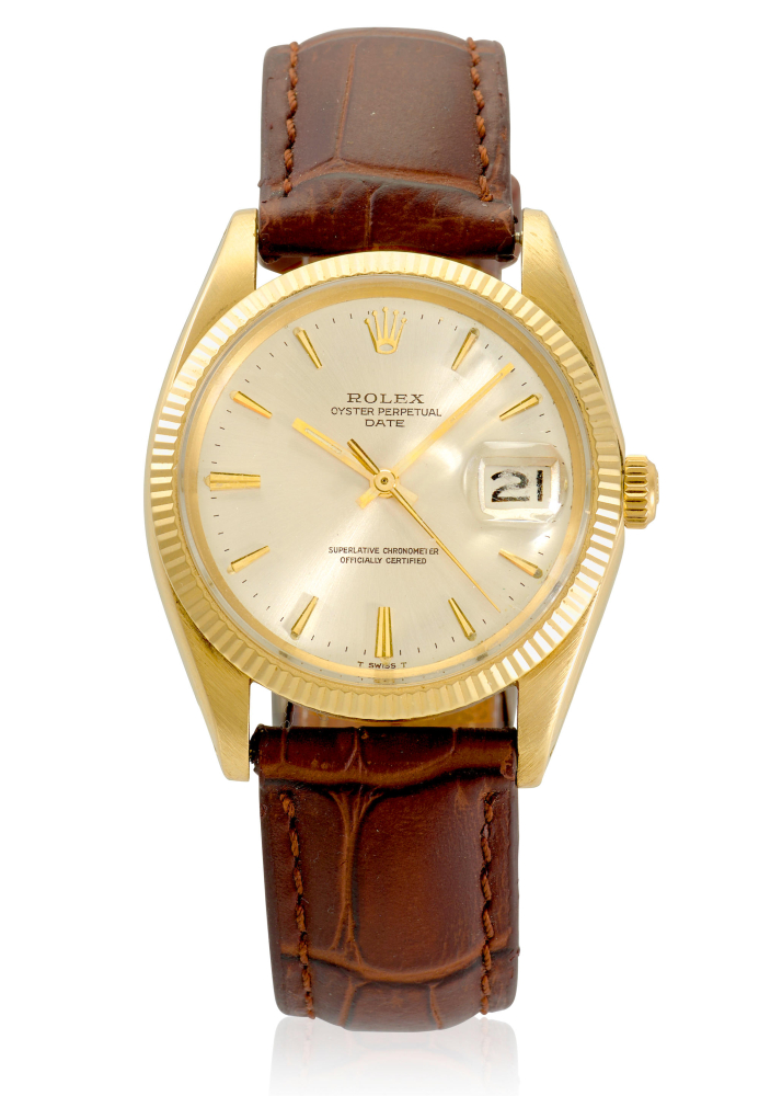 ROLEX. A 14K GOLD AUTOMATIC CALENDAR WRISTWATCH