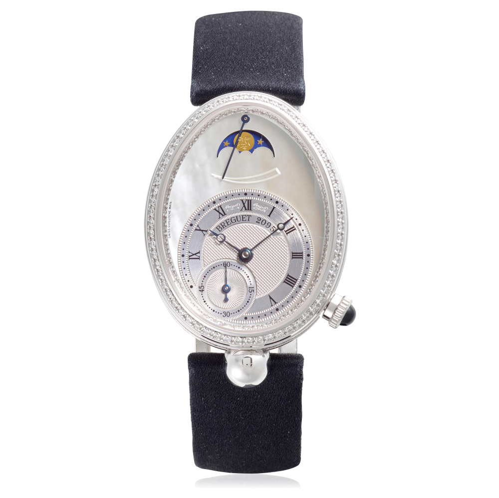 BREGUET. A FINE 18K WHITE GOLD AND DIAMOND SET AUTOMATIC WRISTWATCH WITH MOON PHASE AND POWER RESERVE INDICATION