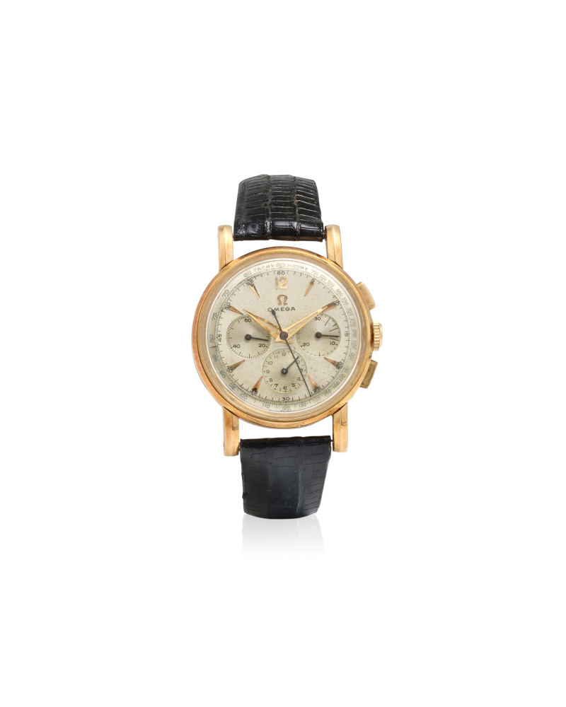 OMEGA. AN 14K GOLD MANUAL WIND CHRONOGRAPH WRISTWATCH