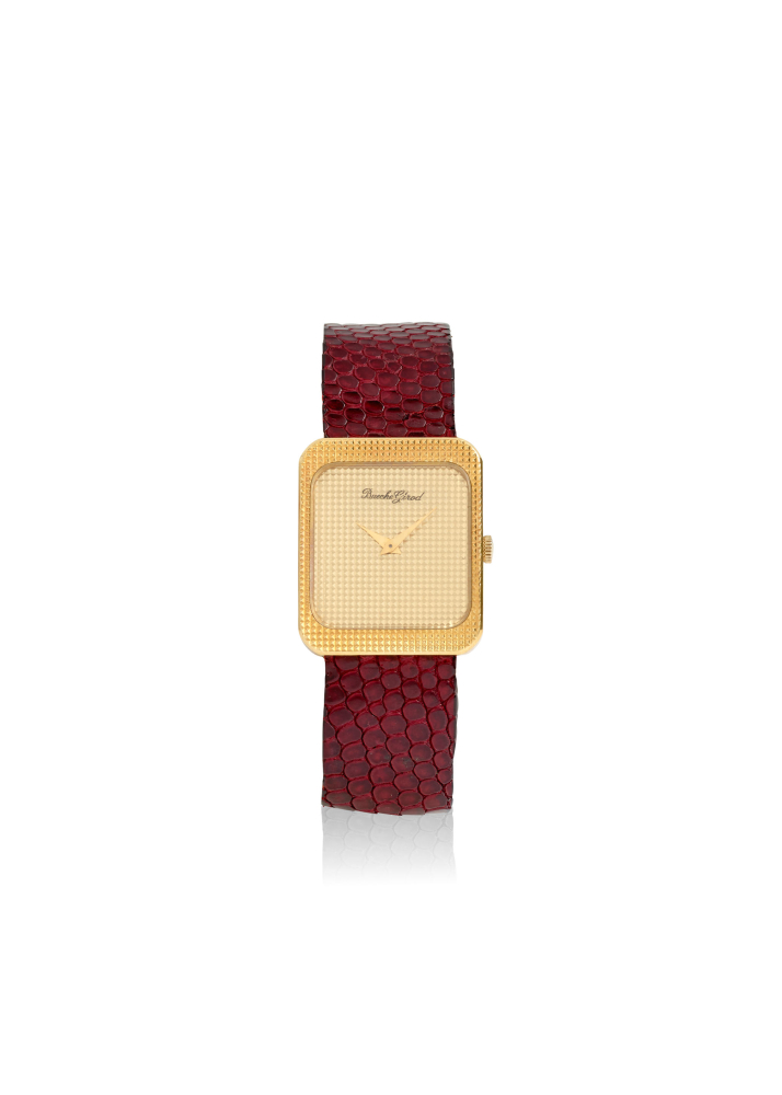 BUECHE GIROD. AN 18K GOLD MANUAL WIND WRISTWATCH