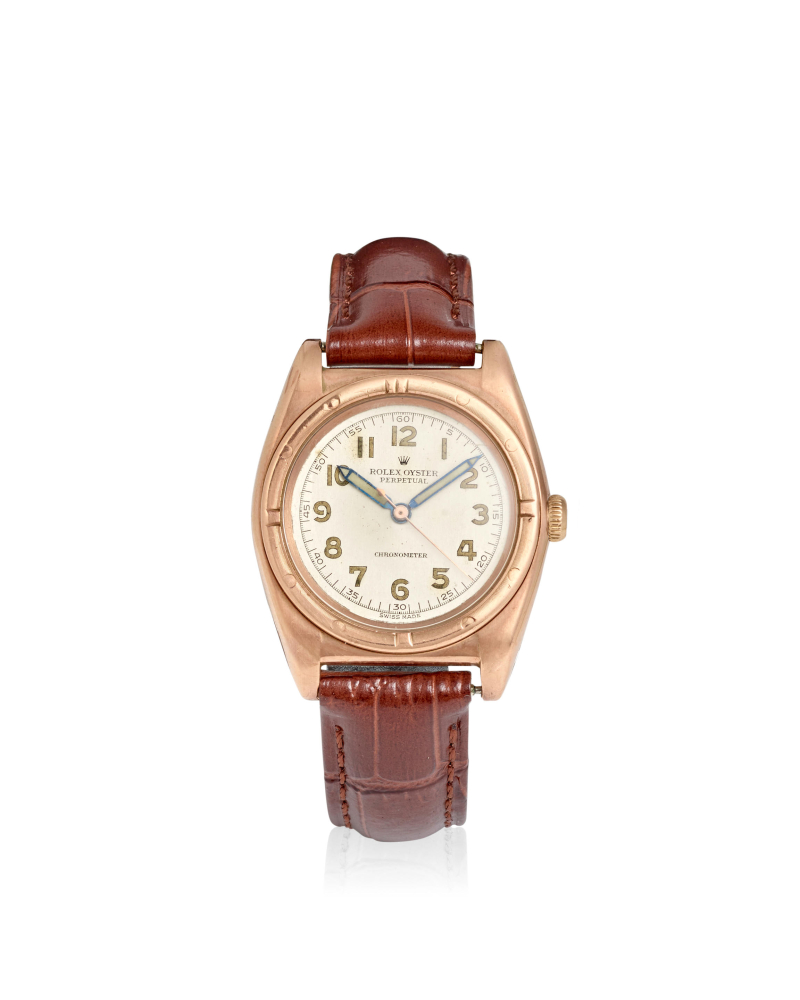 ROLEX. A 14K ROSE GOLD AND STAINLESS STEEL AUTOMATIC BUBBLE BACK WRISTWATCH