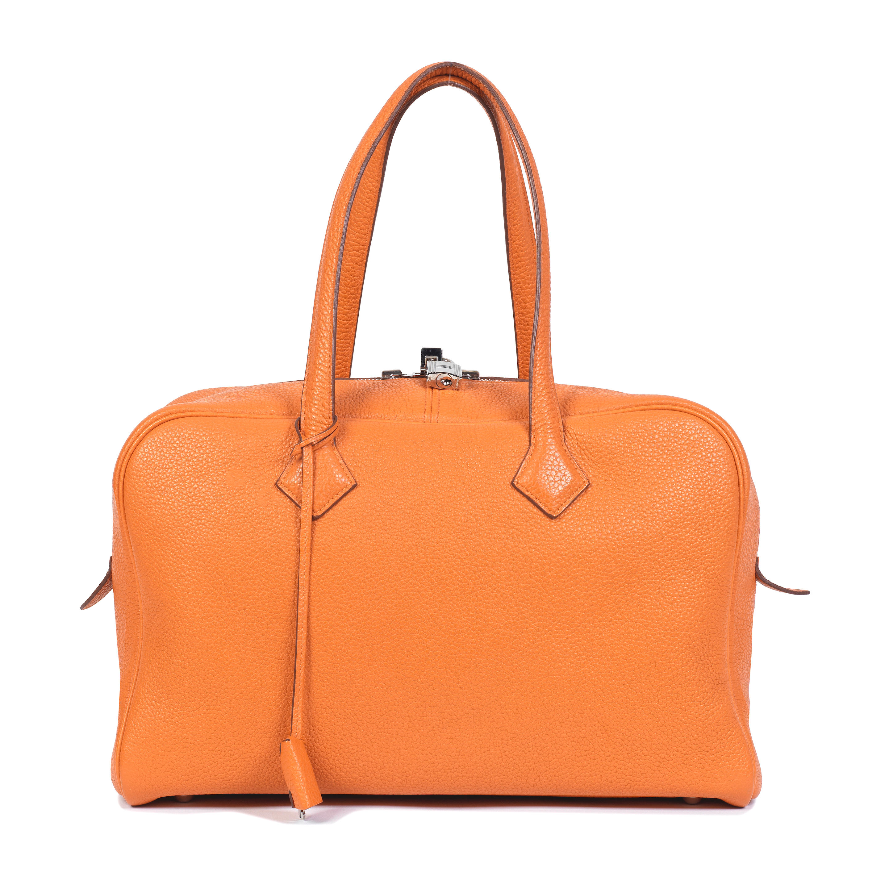 Hermès: an Orange H Clemence Leather Victoria II 35
