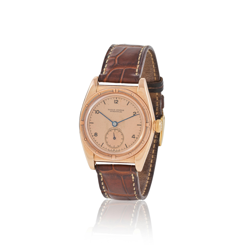 Rolex. A fine 14K gold automatic wristwatch