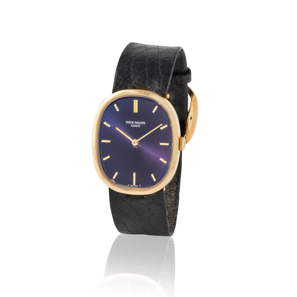 Patek Philippe. A fine 18K gold manual wind wristwatch with sigma dial