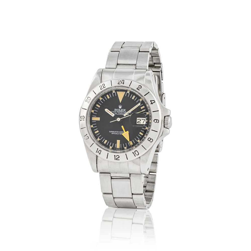 Rolex. A stainless steel automatic calendar bracelet watch with dual time zone