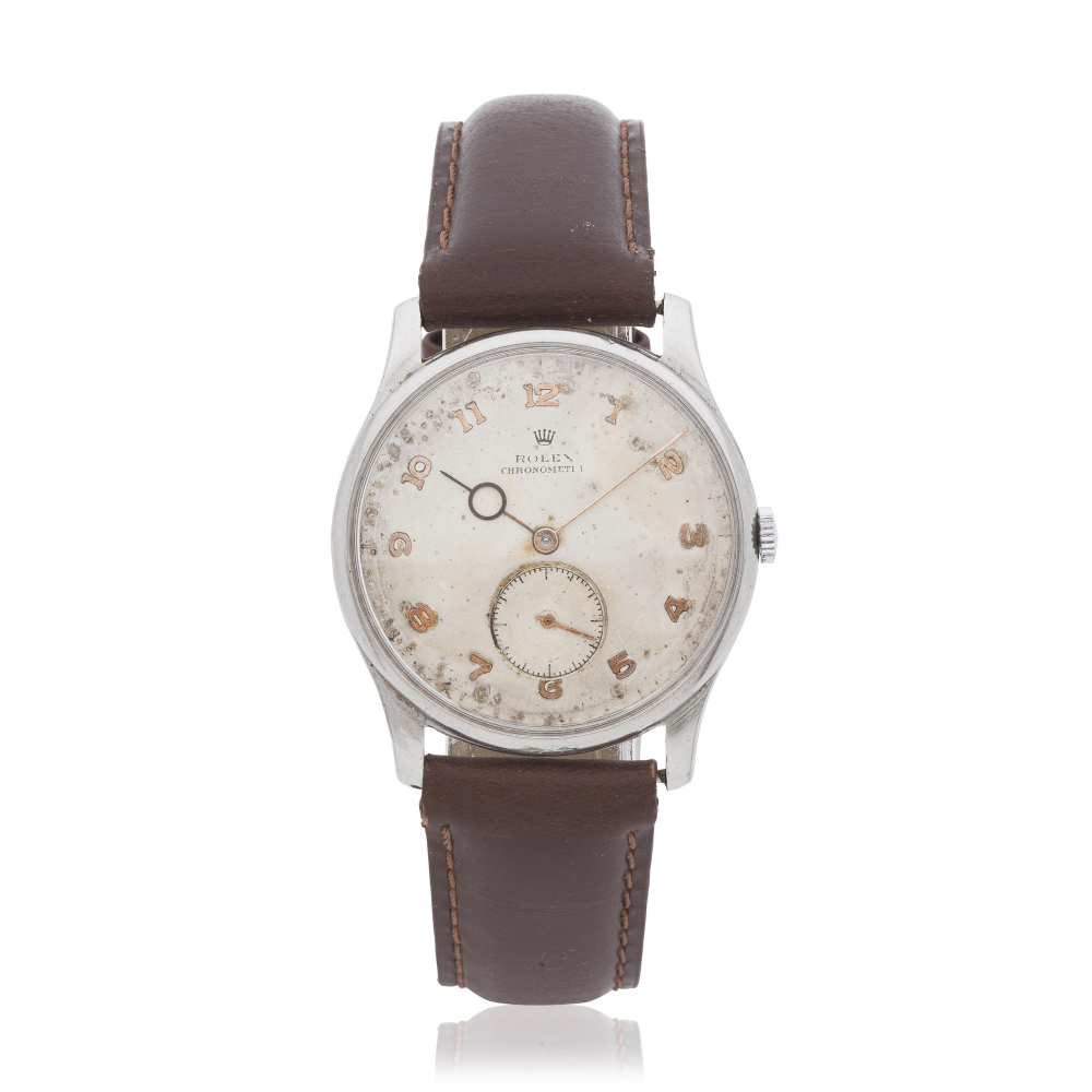 Rolex. A stainless steel manual wind wristwatch