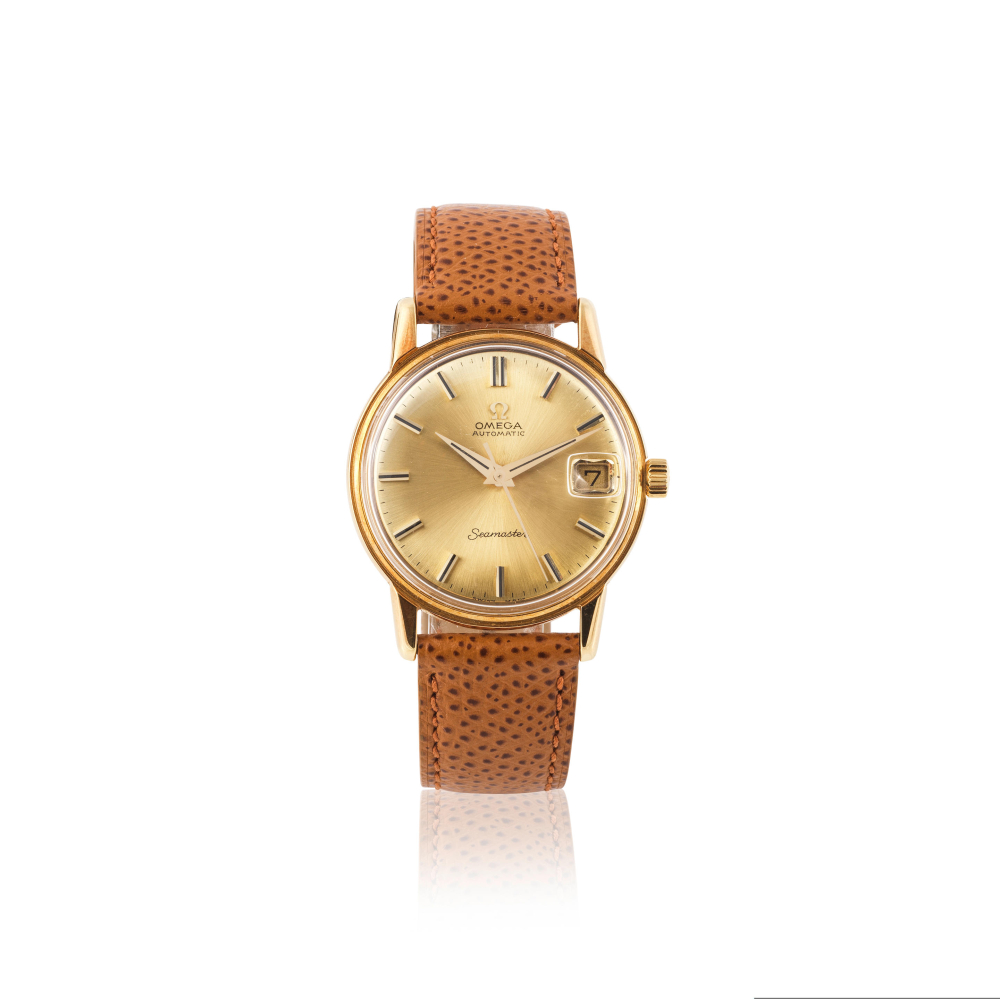 Omega. An 18K gold automatic calendar wristwatch