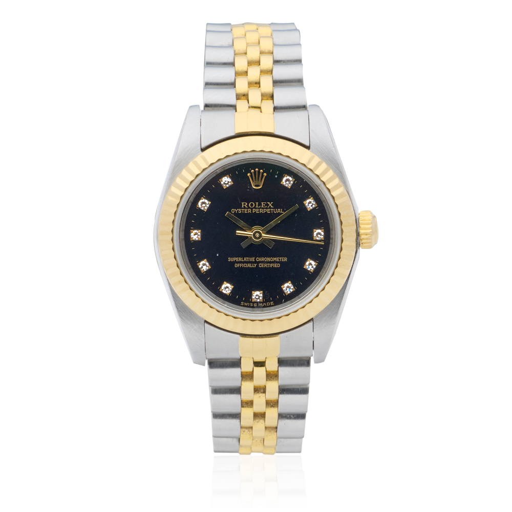Rolex. A lady's 18K gold and stainless steel automatic calendar bracelet watch
