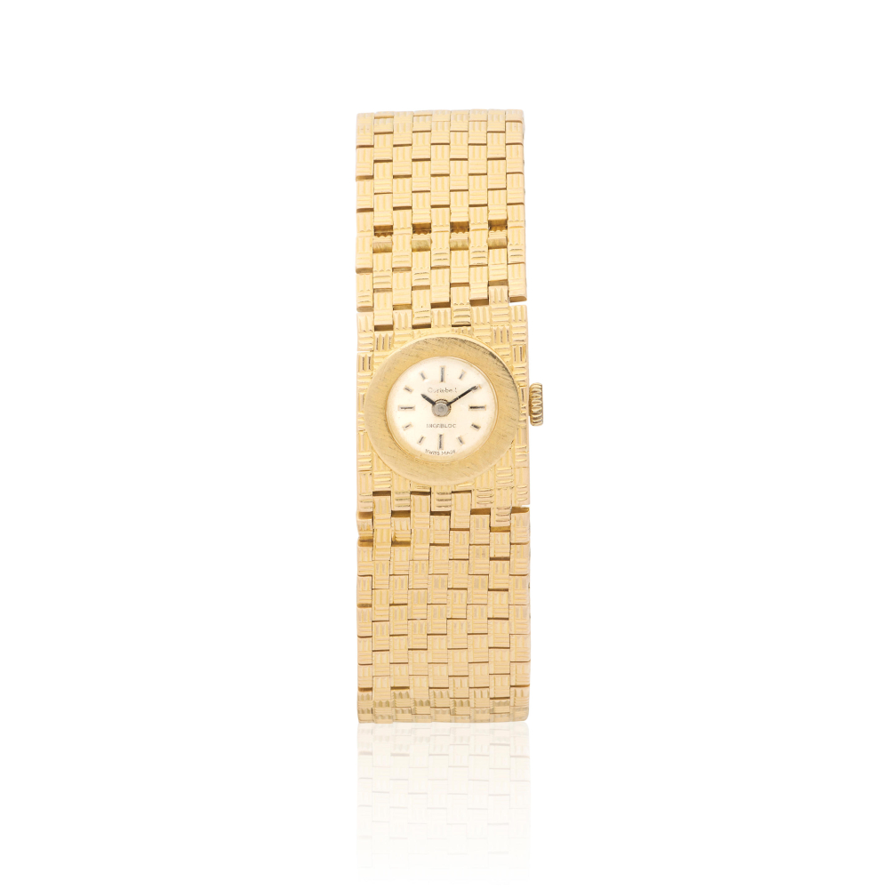 Cortebert. A lady's 18K gold manual wind bracelet watch