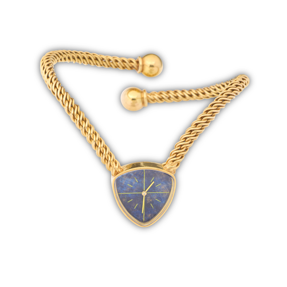 Ebel. A lady's asymmetric manual wind cuff watch