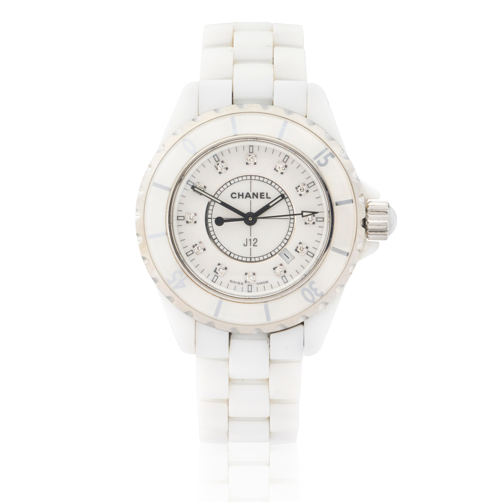Chanel. A lady's white ceramic and stainless steel quartz calendar bracelet watch with diamond set dial