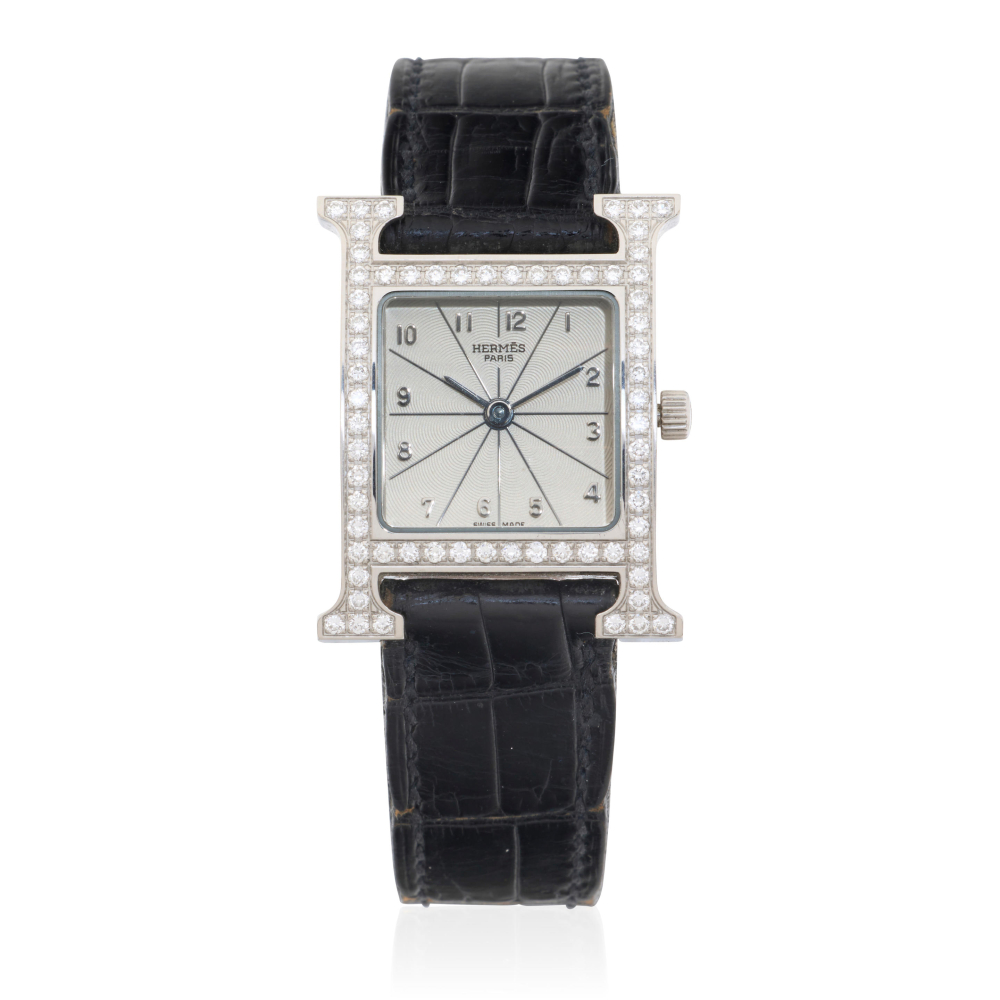Hermès. A lady's stainless steel and diamond set quartz wristwatch