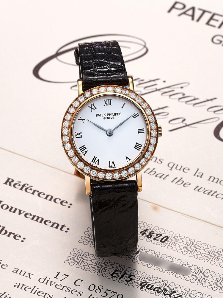PATEK PHILIPPE | CALATRAVA, REF.4820, A LADY'S YELLOW GOLD AND DIAMOND-SET WRISTWATCH, CIRCA 1995