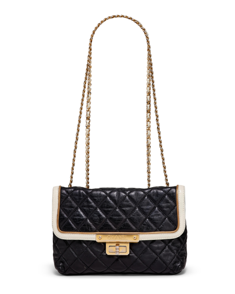 CHANEL: BLACK WHITE AND GOLD QUILTED LAMBSKIN MADEMOISELLE EAST WEST FLAP BAG WITH GOLD TONED HARDWARE 2011