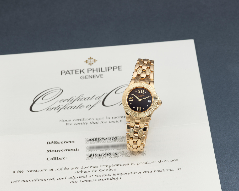 PATEK PHILIPPE | NEPTUNE, REF.4881/1J-010, A LADY'S BRAND NEW YELLOW GOLD BRACELET WATCH WITH DATE, CIRCA 2024