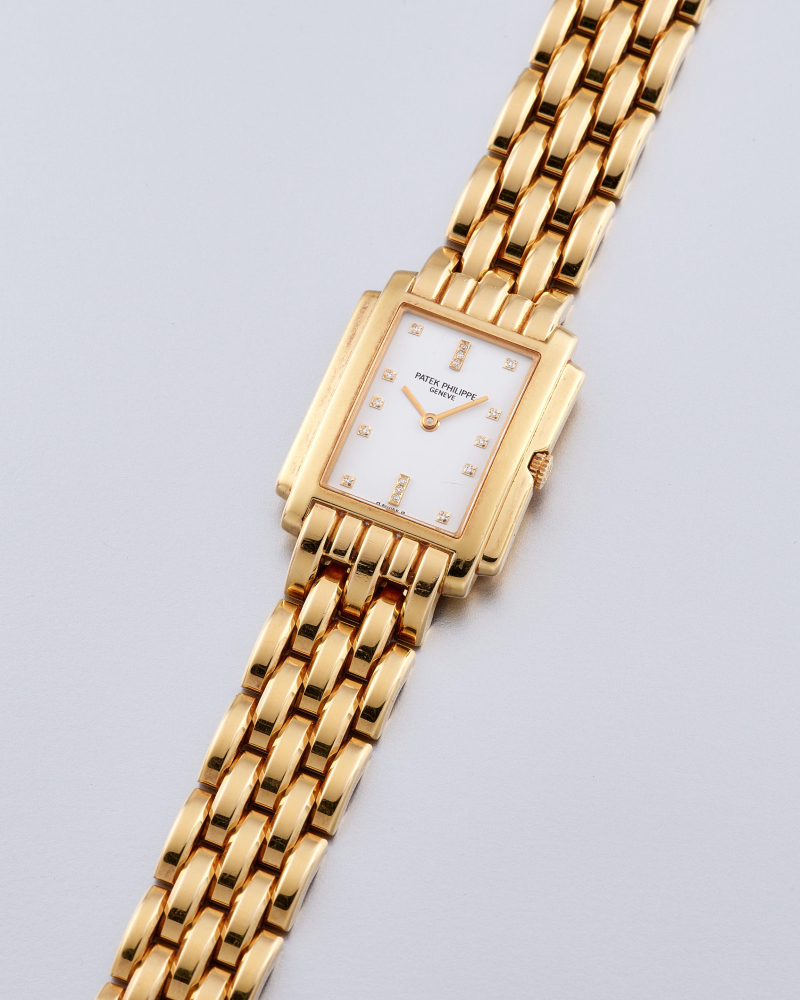 PATEK PHILIPPE | GONDOLO, REF.4824/1, A LADY'S YELLOW GOLD AND DIAMOND-SET BRACELET WATCH, CIRCA 1990