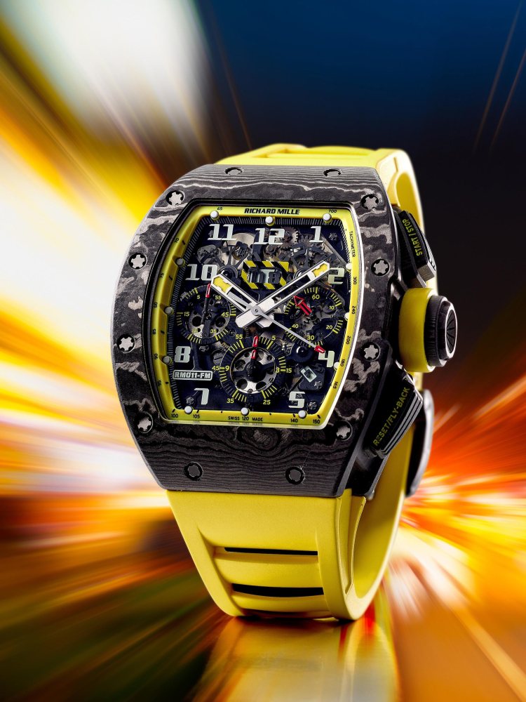 RICHARD MILLE | FELIPE MASSA - YELLOW STORM, REF.RM011-FM, A LIMITED EDITION CARBON TPT OPENWORKED ANNUAL CALENDAR FLYBACK CHRONOGRAPH WRISTWATCH, CIRCA 2015 - FIRST TIME IN AUCTION