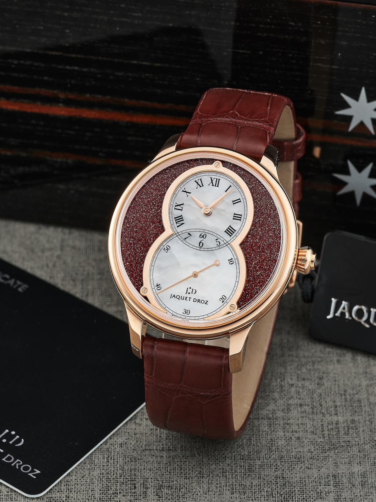 JAQUET DROZ | A LIMITED EDITION PINK GOLD WRISTWATCH WITH SUNSTONE AND MOTHER-OF-PEARL DIAL, CIRCA 2022