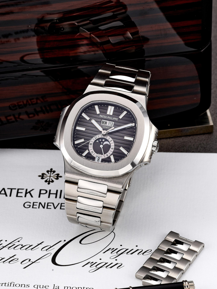 PATEK PHILIPPE | NAUTILUS, REF.5726/1A-001, A FINE STAINLESS STEEL ANNUAL CALENDAR WRISTWATCH WITH MOON PHASES AND 24 HOUR INDICATION, CIRCA 2015