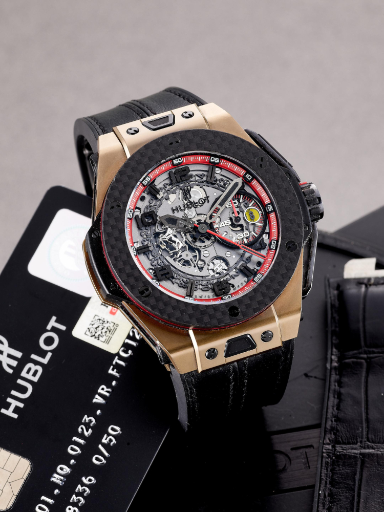 HUBLOT | BIG BANG "FERRARI", REF.401.MQ.0123.VR.FTC12, A LIMITED EDITION TITANIUM, YELLOW GOLD AND CARBON FLYBACK CHRONOGRAPH WRISTWATCH WITH DATE, CIRCA 2015