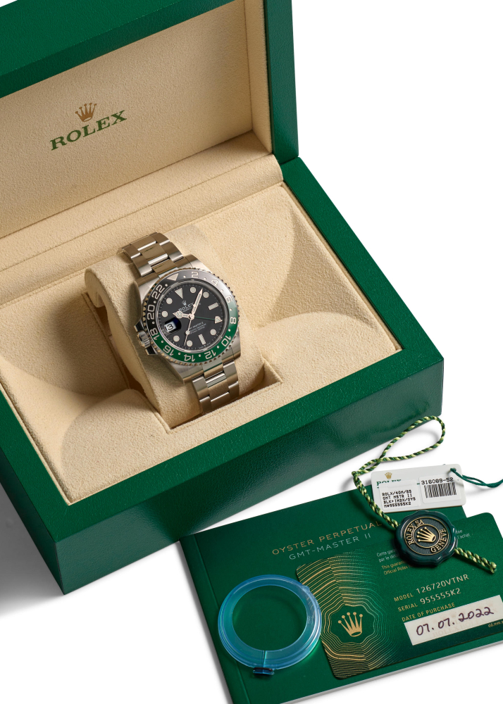 ROLEX. A STAINLESS STEEL AUTOMATIC CALENDAR BRACELET WATCH WITH DUAL TIME ZONE