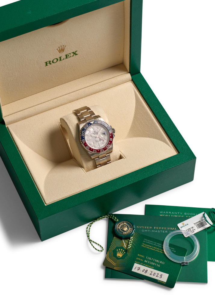 ROLEX. AN 18K WHITE GOLD AUTOMATIC CALENDAR BRACELET WATCH WITH DUAL TIME ZONE