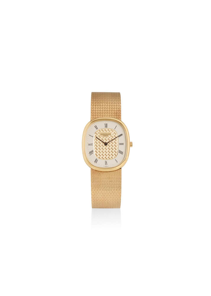PATEK PHILIPPE. AN 18K GOLD QUARTZ BRACELET WATCH