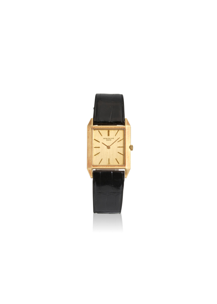 PATEK PHILIPPE. AN 18K GOLD MANUAL WIND WRISTWATCH