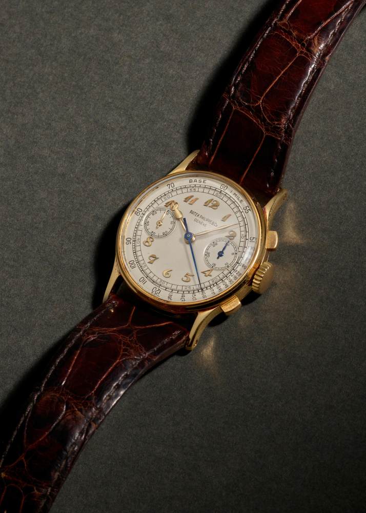 PATEK PHILIPPE. AN 18K GOLD MANUAL WIND CHRONOGRAPH WRISTWATCH